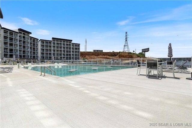 view of pool featuring a patio area