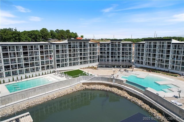 view of pool featuring a hot tub