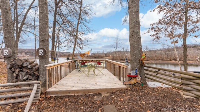 deck featuring a water view