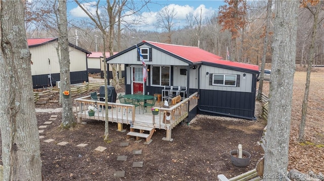 view of front of property featuring a deck