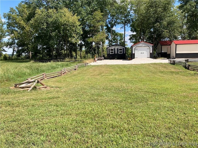 view of yard with a garage