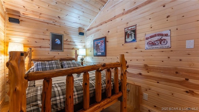 bedroom with lofted ceiling and wooden ceiling