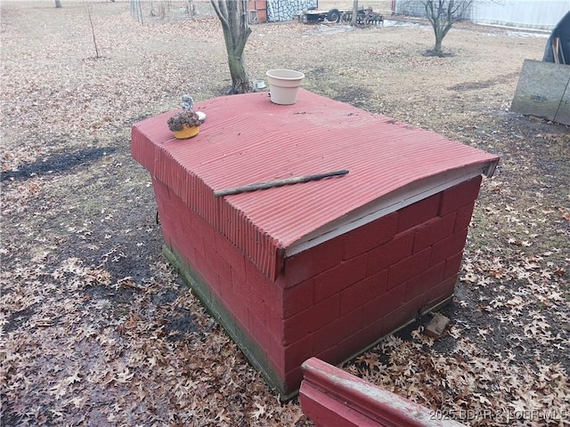 view of entry to storm shelter