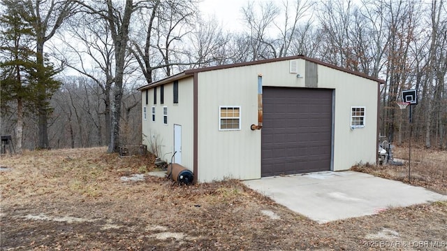 view of outbuilding featuring a garage