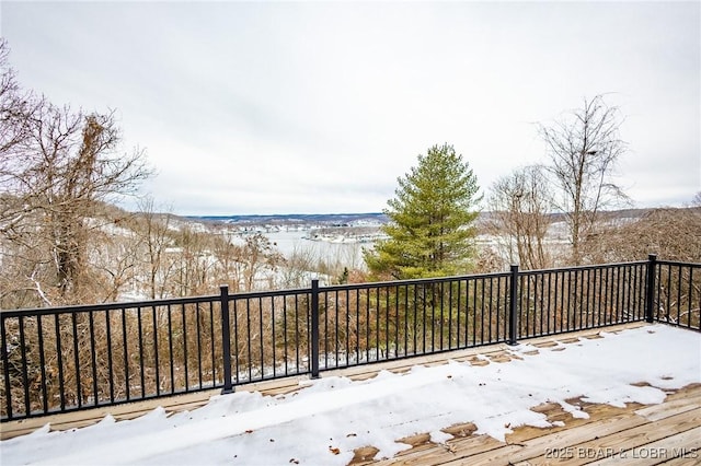 view of snow covered deck