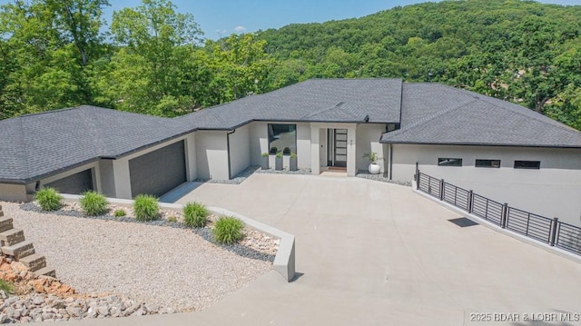 view of front of home with a garage