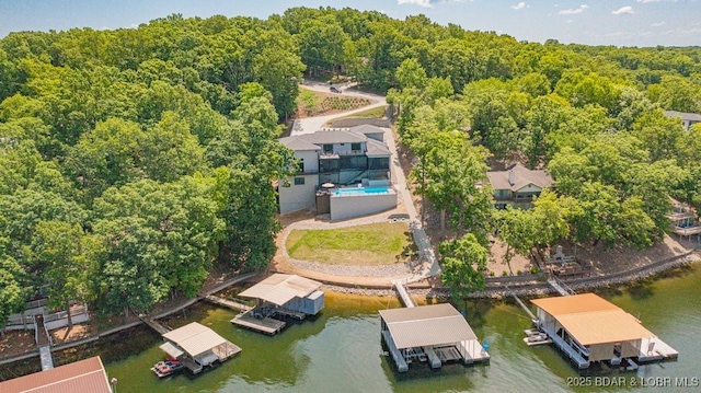 birds eye view of property featuring a water view