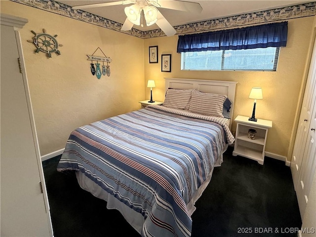 bedroom with ceiling fan and carpet