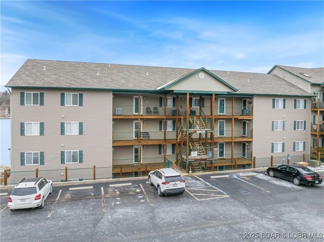 133 Cedar Glen Ct Unit 3D, Camdenton, MO 65020 - view of apartment building / complex with uncovered parking