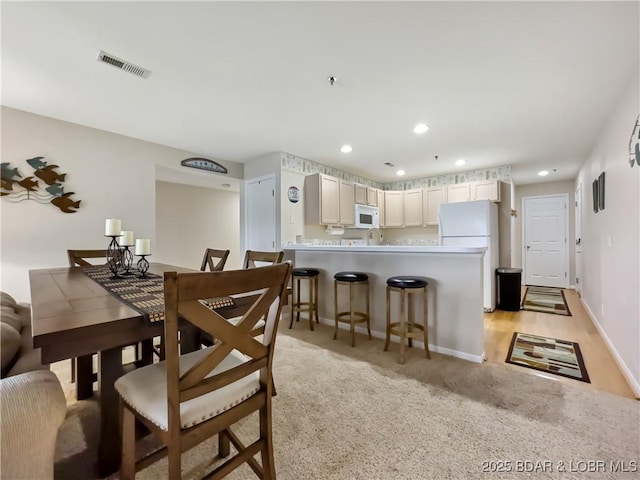 133 Cedar Glen Ct Unit 3D, Camdenton, MO 65020 - dining space featuring recessed lighting and light carpet