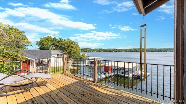 wooden deck with a water view