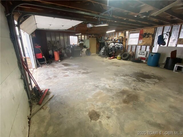 23417 Hwy Tt, Versailles, MO 65084 - garage featuring a garage door opener