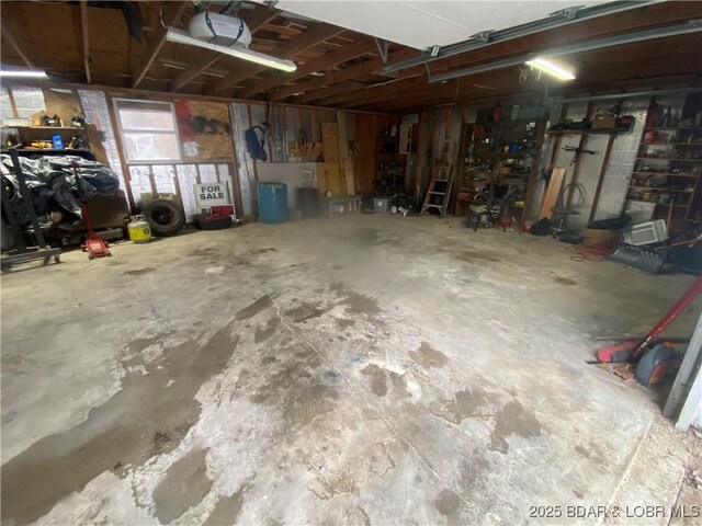 23417 Hwy Tt, Versailles, MO 65084 - garage with a garage door opener