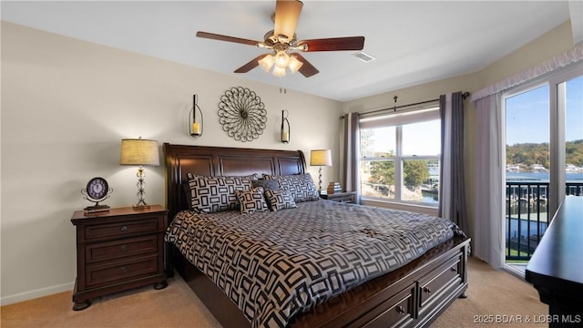 316 Cedar Heights Dr Unit 2C, Camdenton, MO 65020 - bedroom with light carpet, access to outside, baseboards, and ceiling fan