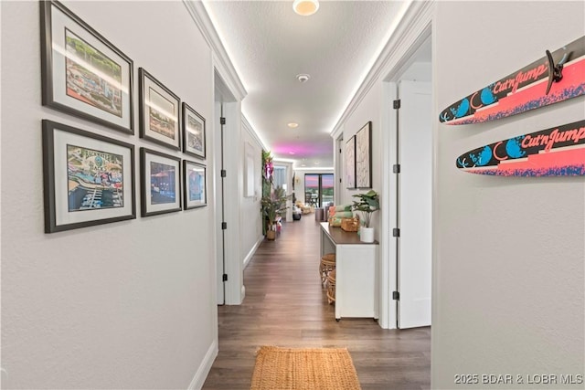 1065 Topsider Ln Unit 408, Osage Beach, MO 65065 - hallway featuring wood finished floors, baseboards, and a textured ceiling