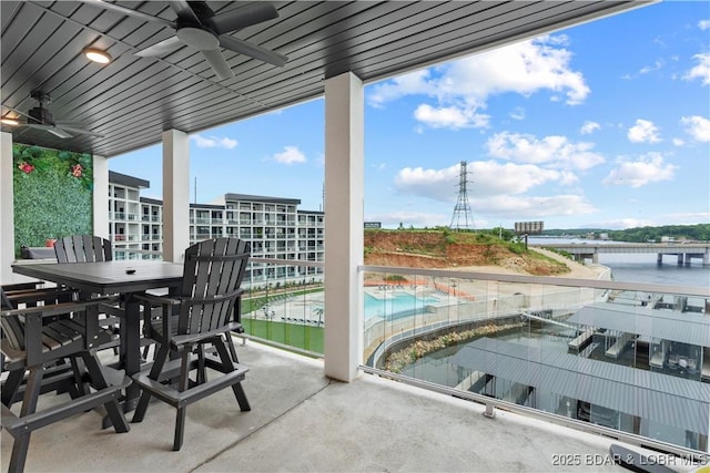 1065 Topsider Ln Unit 408, Osage Beach, MO 65065 - balcony featuring a ceiling fan and a water view