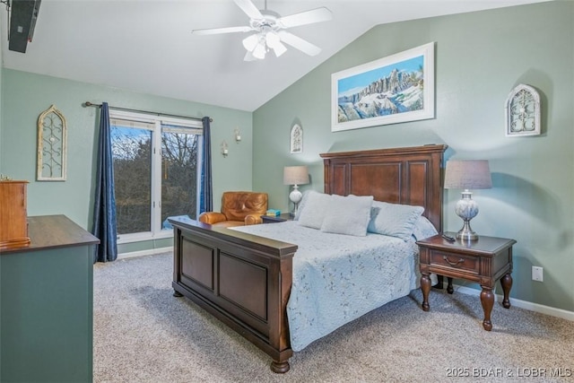 bedroom featuring light carpet, lofted ceiling, a ceiling fan, and baseboards