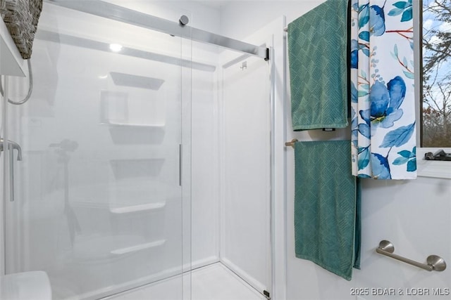 bathroom with a stall shower