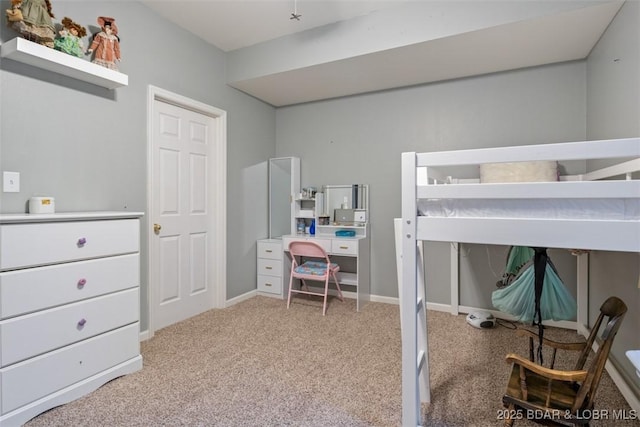 carpeted bedroom with baseboards