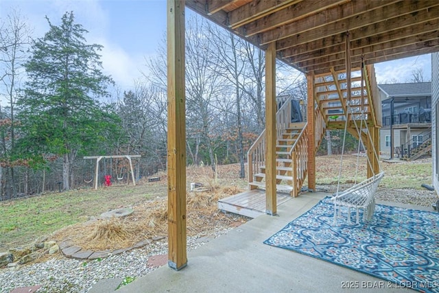 view of patio / terrace featuring stairway