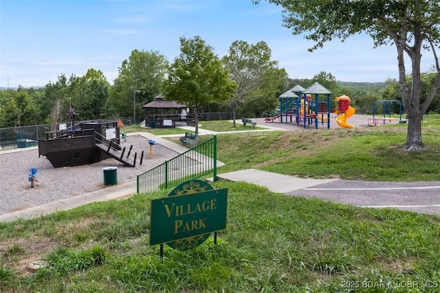 exterior space with a gazebo, fence, and a yard