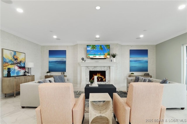 living room with marble finish floor, recessed lighting, a fireplace, and crown molding