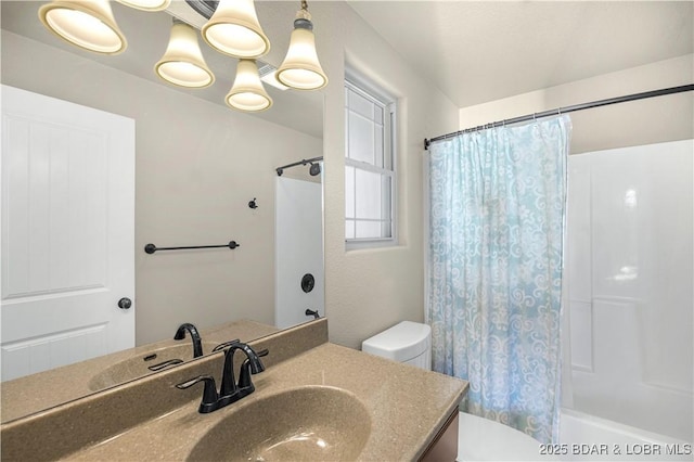 full bathroom with toilet, shower / tub combo with curtain, and vanity