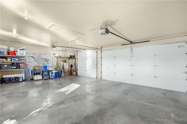 garage featuring a garage door opener