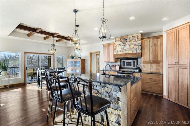 175 Black Rock Rd, Camdenton, MO 65020 - kitchen featuring recessed lighting, coffered ceiling, dark wood finished floors, a kitchen bar, and beam ceiling