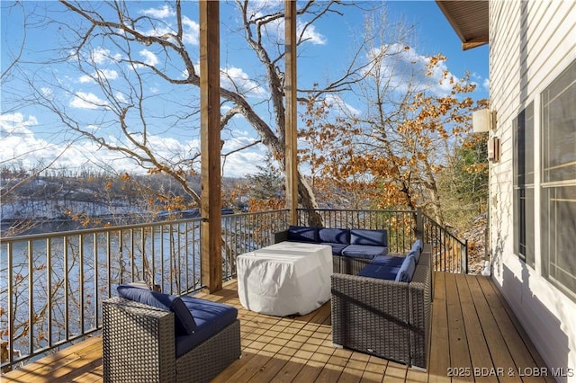 wooden deck featuring an outdoor living space