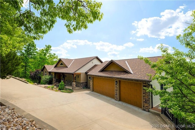 175 Black Rock Rd, Camdenton, MO 65020 - view of front of house featuring stone siding, a garage, concrete driveway, a shingled roof, and a porch