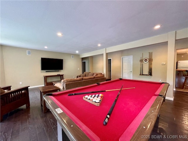 recreation room with dark wood-style floors, baseboards, visible vents, and recessed lighting