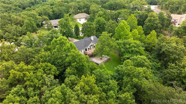 aerial view featuring a view of trees