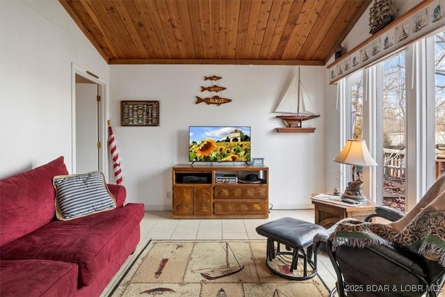 tiled living area featuring lofted ceiling, wood ceiling, and baseboards