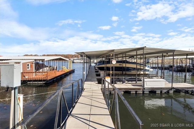 dock area with a water view