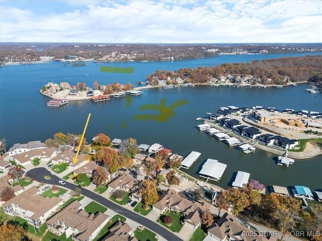 aerial view with a water view and a residential view