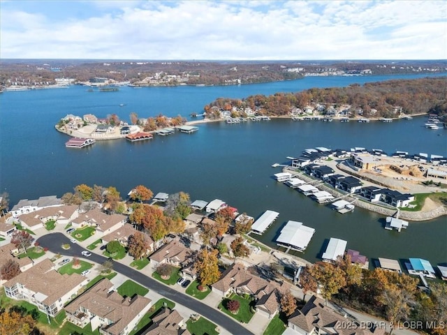 aerial view with a water view and a residential view