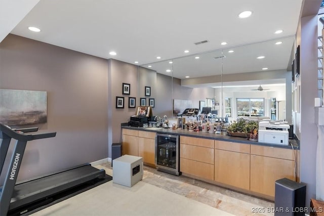 bar featuring beverage cooler, wet bar, visible vents, and recessed lighting