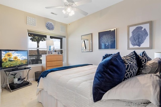 bedroom with ceiling fan and visible vents