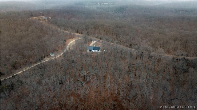 bird's eye view featuring a rural view and a view of trees