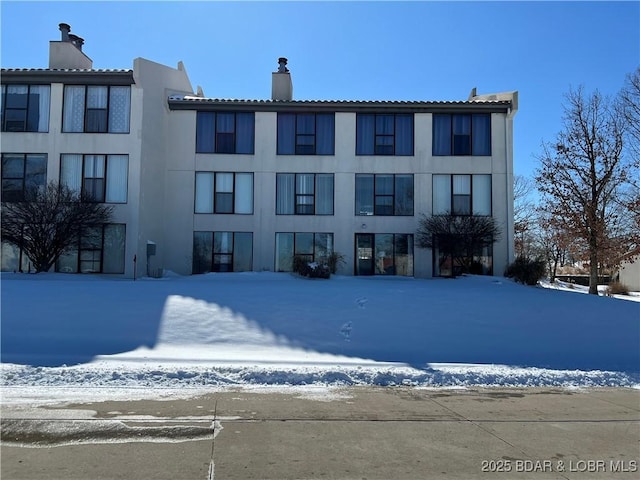 view of snow covered building