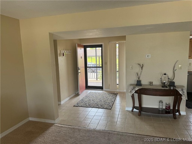 85 La Jolla Dr Unit 352-2A, Lake Ozark, MO 65049 - entrance foyer with baseboards and light tile patterned flooring