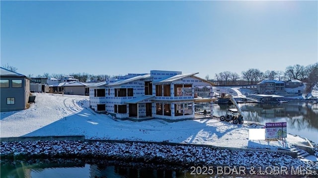 LOT10 Shootout Dr, Osage Beach, MO 65065 - snow covered property with a water view and a residential view