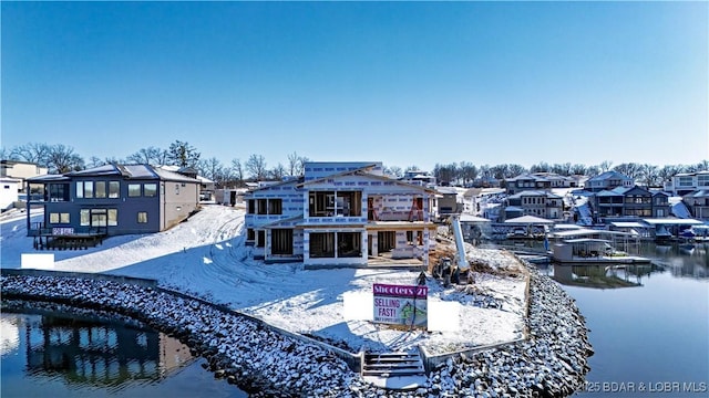 LOT10 Shootout Dr, Osage Beach, MO 65065 - rear view of property with a water view and a residential view