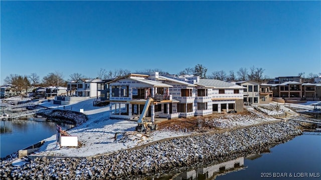 LOT10 Shootout Dr, Osage Beach, MO 65065 - rear view of house featuring a residential view and a water view