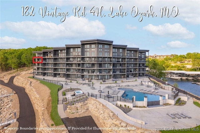 182 Vintage Dr Unit 4H, Lake Ozark, MO 65049 - view of building exterior featuring a water view