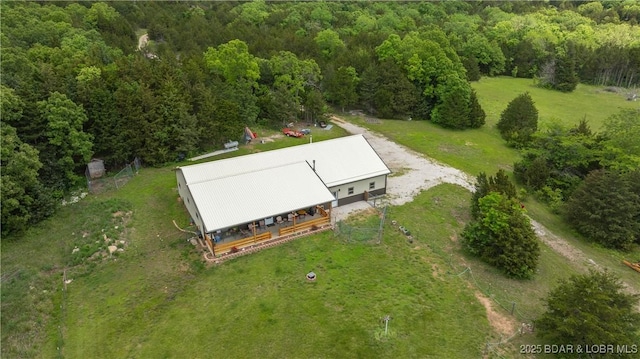 aerial view featuring a view of trees