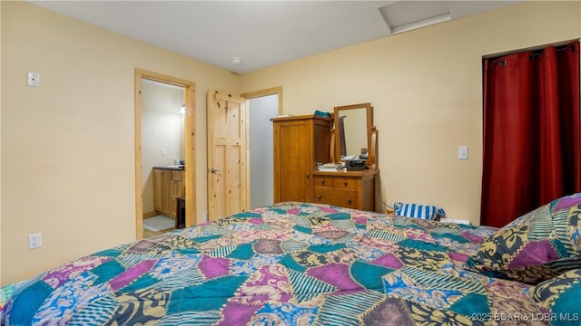 bedroom with attic access