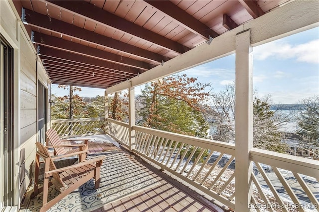 view of snow covered deck