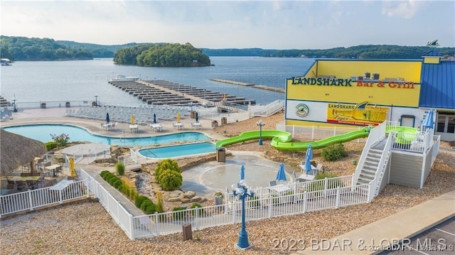 birds eye view of property featuring a water view